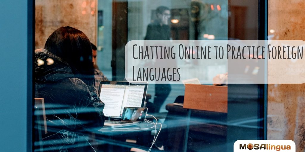 Text reads: Chatting online to practice foreign languages, MosaLingua. View through a window of a person video chatting on their phone and working on their laptop at the same time.