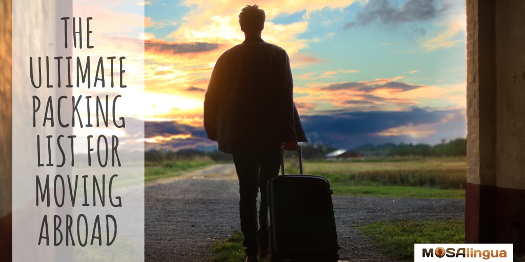 ultimate packing list for moving abroad man with suitcase sunset